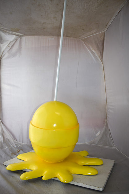Giant Yellow Lollipop Melted on The Ground Resin Statue Size: 31" x 27" x 56"H
