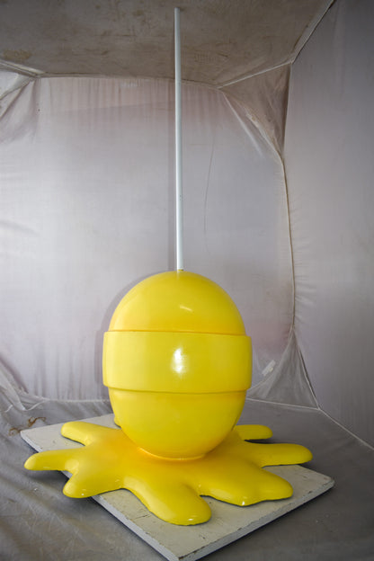 Giant Yellow Lollipop Melted on The Ground Resin Statue Size: 31" x 27" x 56"H