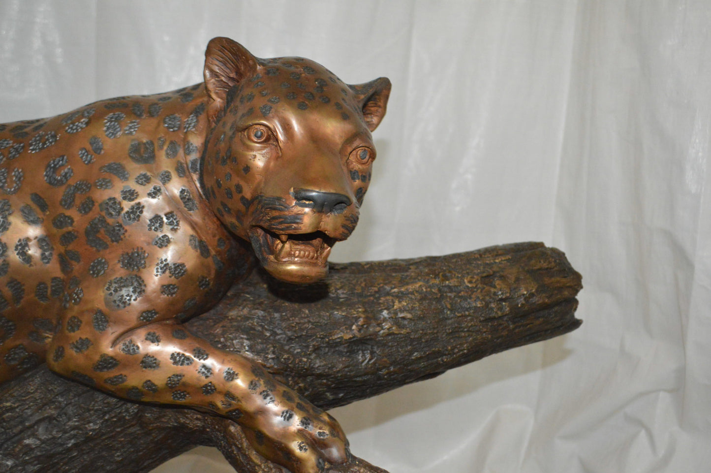 Two Jaguars On A Tree Bronze Statue - Size: 66"L x 34"W x 44"H.