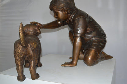 Boy and Dog Bronze Statue - Size: 30"L x 18"W x 18"H.