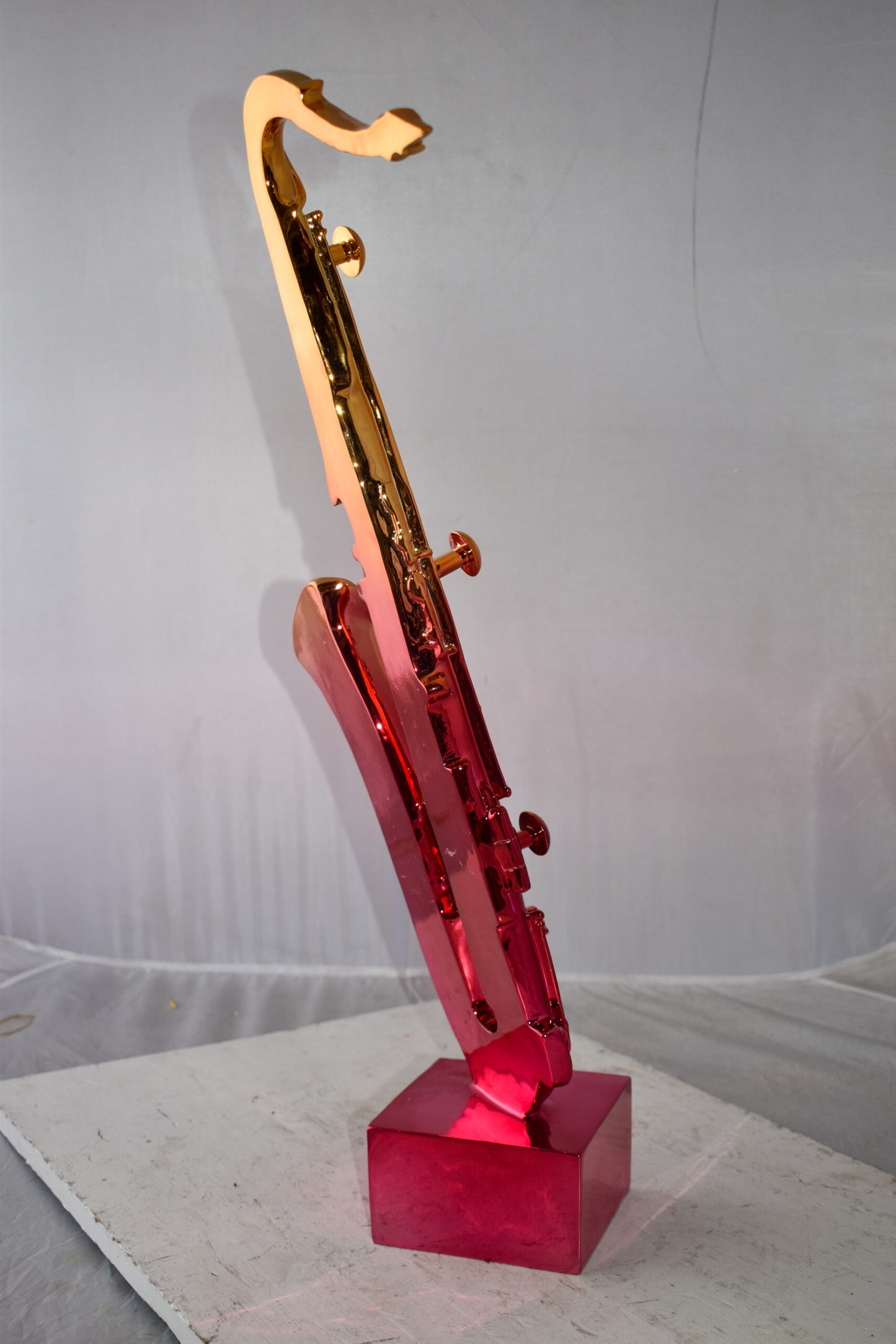 Modern Art Pink and Gold Saxophone Statue Made of Resin Size: 10" x 8" x 28"H