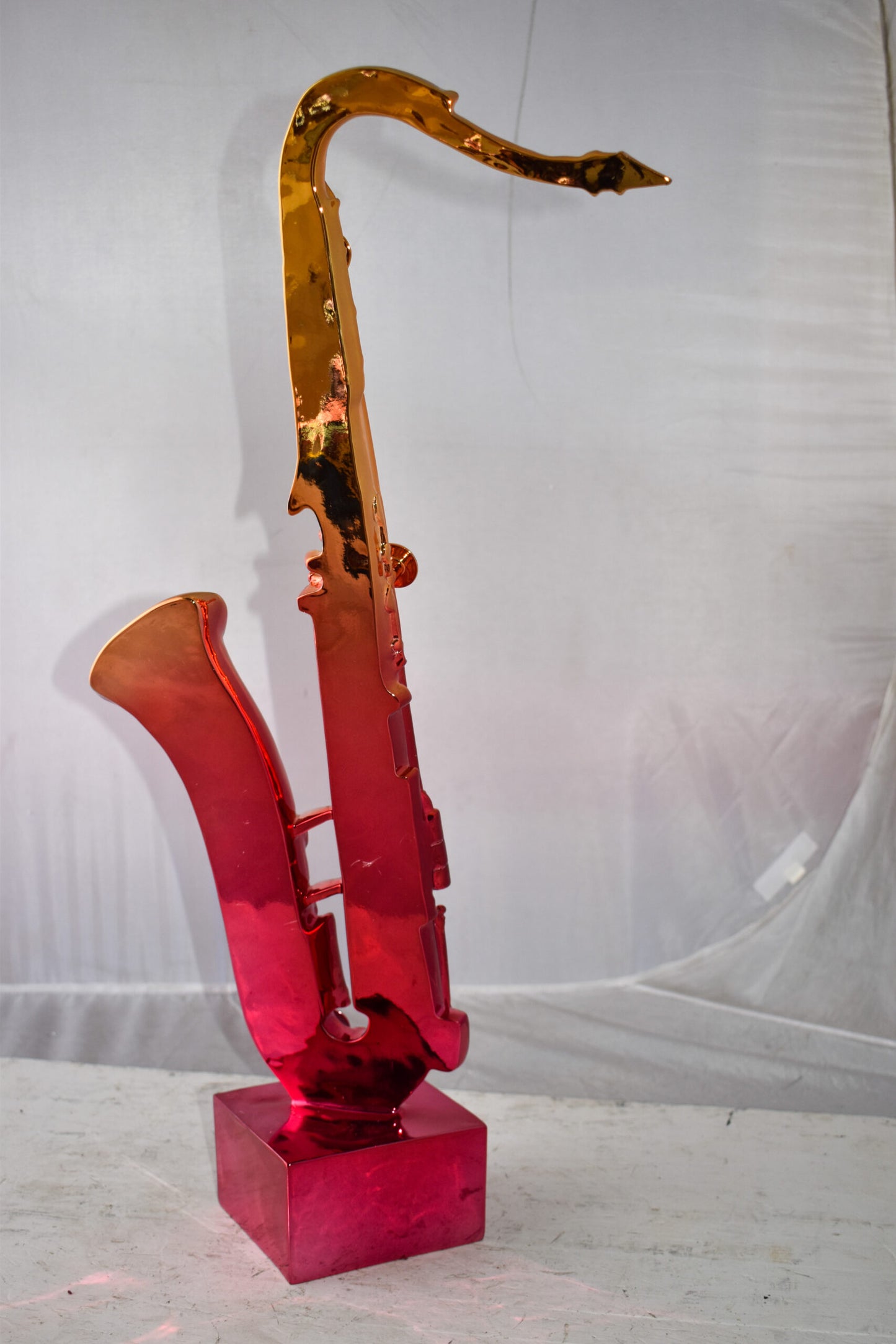 Modern Art Pink and Gold Saxophone Statue Made of Resin Size: 10" x 8" x 28"H
