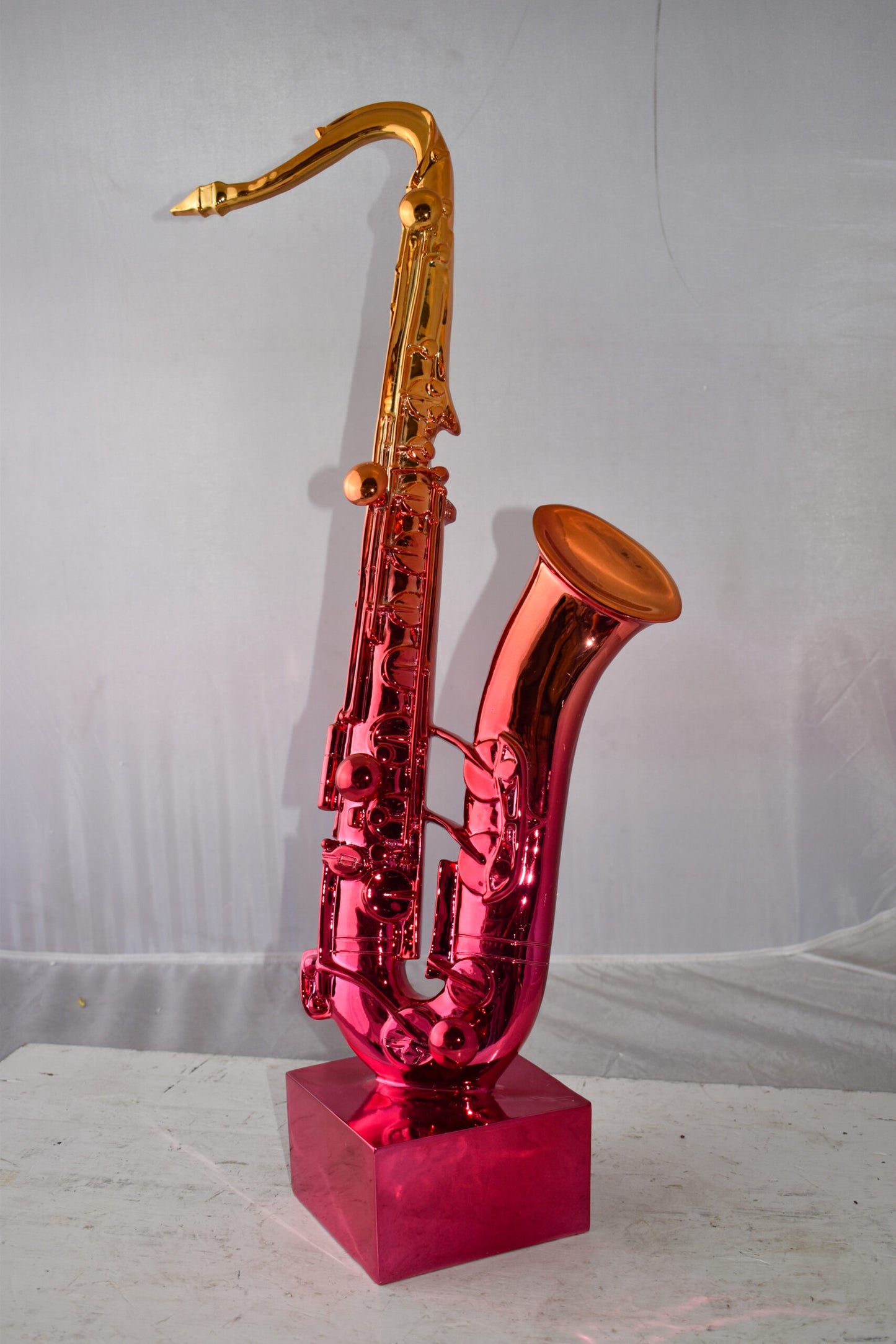 Modern Art Pink and Gold Saxophone Statue Made of Resin Size: 10" x 8" x 28"H