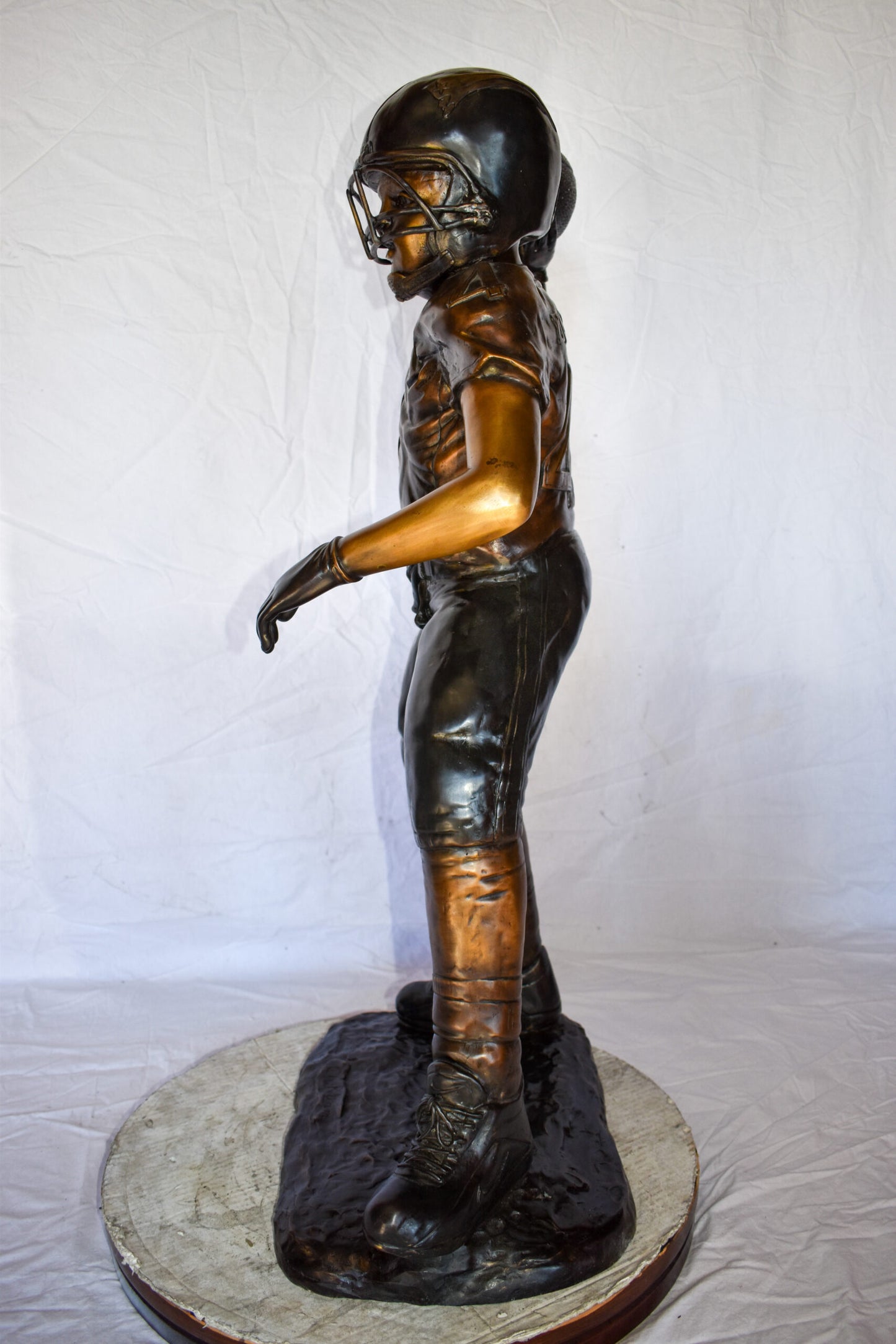 Young Boy Playing Football Bronze Statue Size: 26" x 14" x 43"H