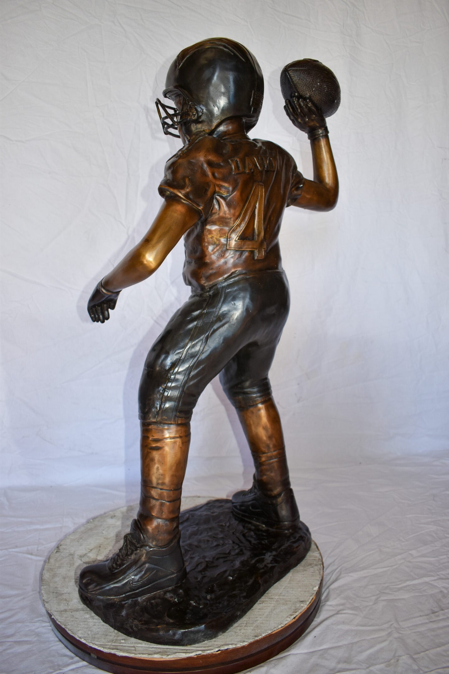 Young Boy Playing Football Bronze Statue Size: 26" x 14" x 43"H