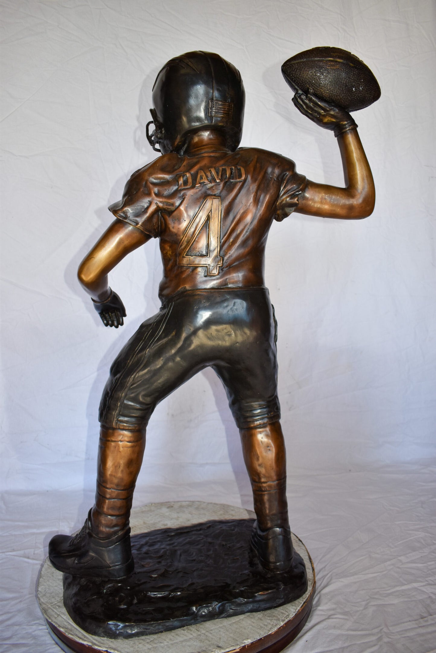 Young Boy Playing Football Bronze Statue Size: 26" x 14" x 43"H