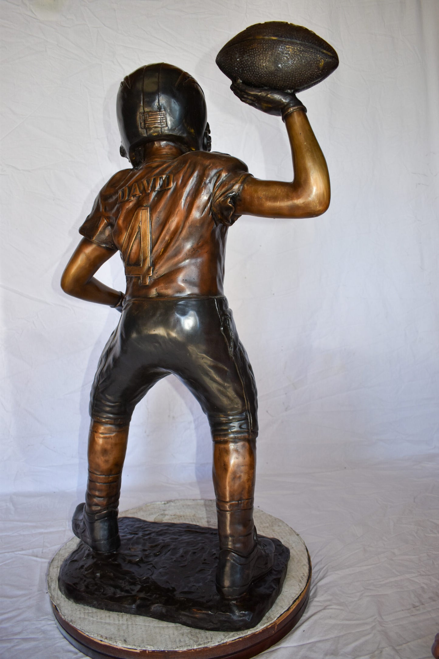 Young Boy Playing Football Bronze Statue Size: 26" x 14" x 43"H