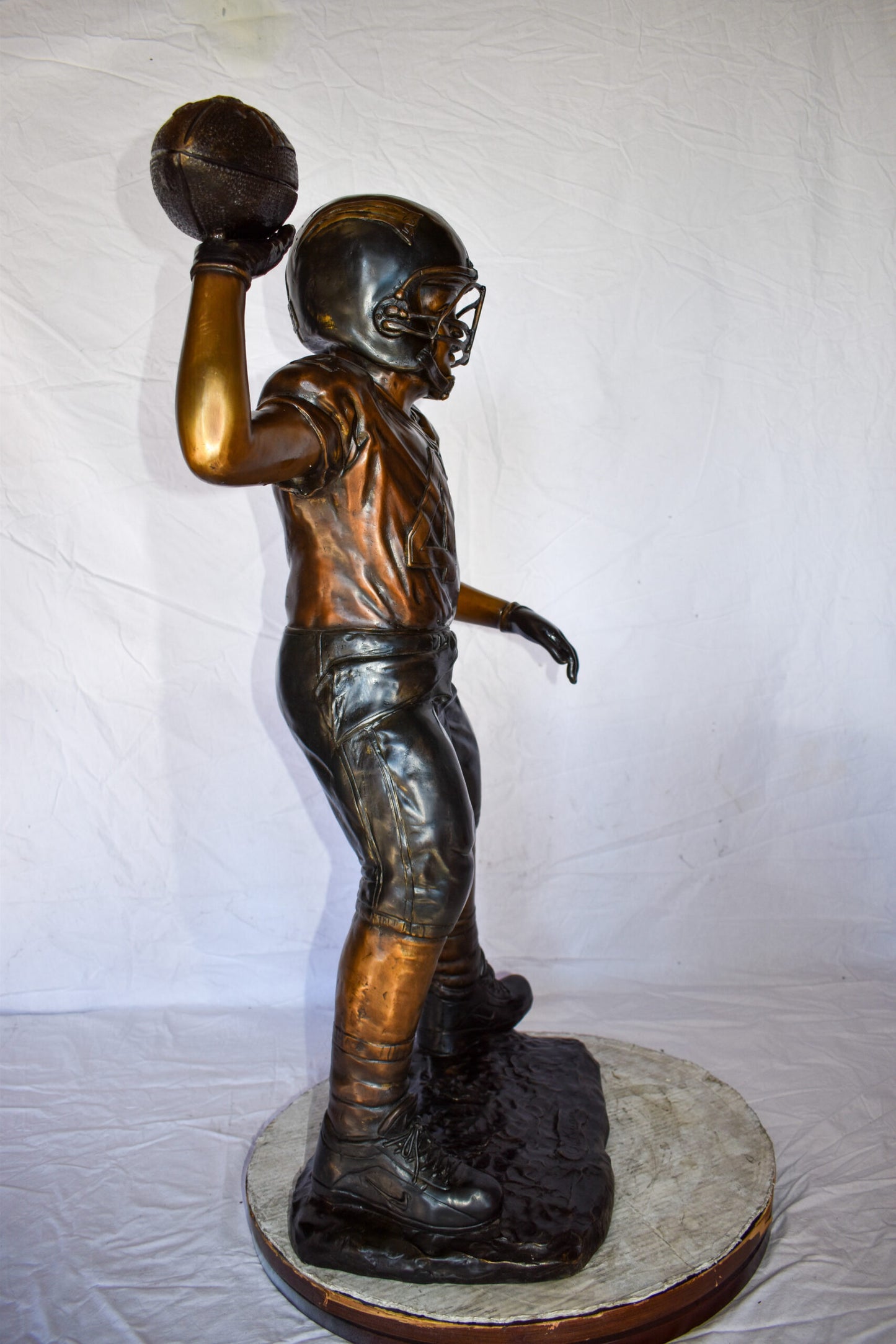 Young Boy Playing Football Bronze Statue Size: 26" x 14" x 43"H