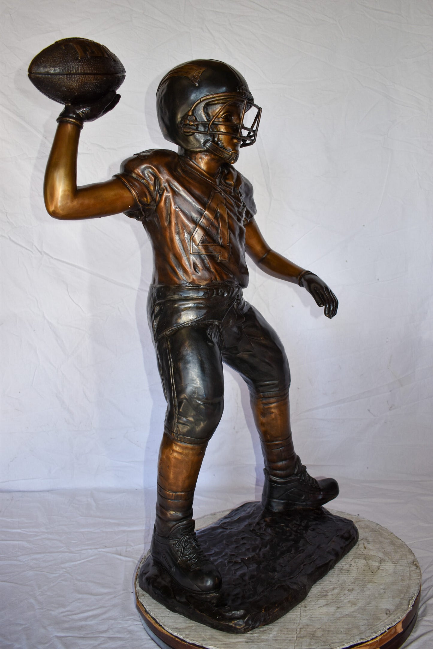 Young Boy Playing Football Bronze Statue Size: 26" x 14" x 43"H