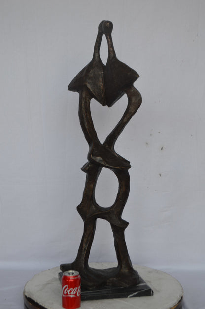 Modern art abstract, a couple kissing bronze statue - Size: 13"L x 11"W x 40"H.