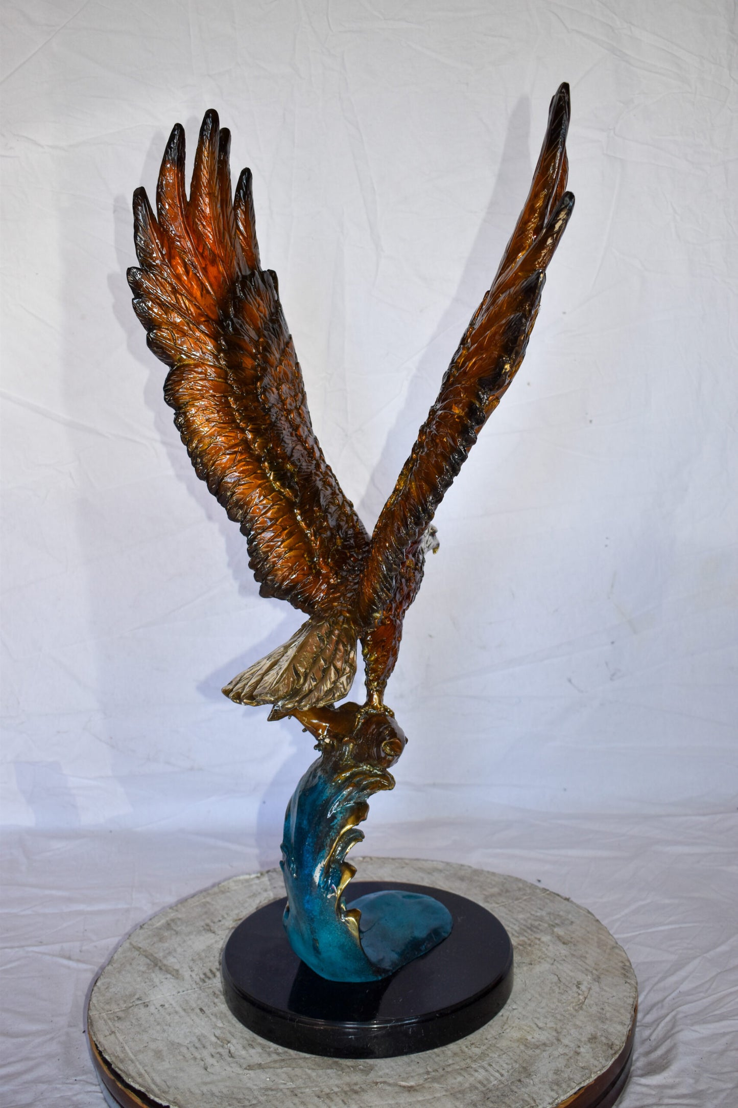 Eagle In Action Catching a Fish from Water Bronze Statue Size: 18" x 17" x 37"H