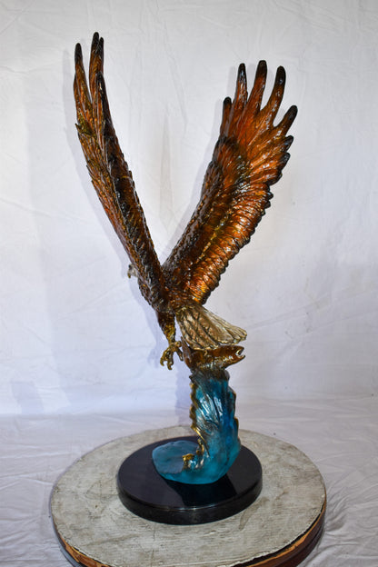Eagle In Action Catching a Fish from Water Bronze Statue Size: 18" x 17" x 37"H