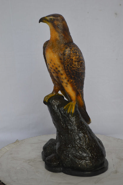Hawk on a Rock bronze statue - Size: 12"L x 9"W x 22"H.