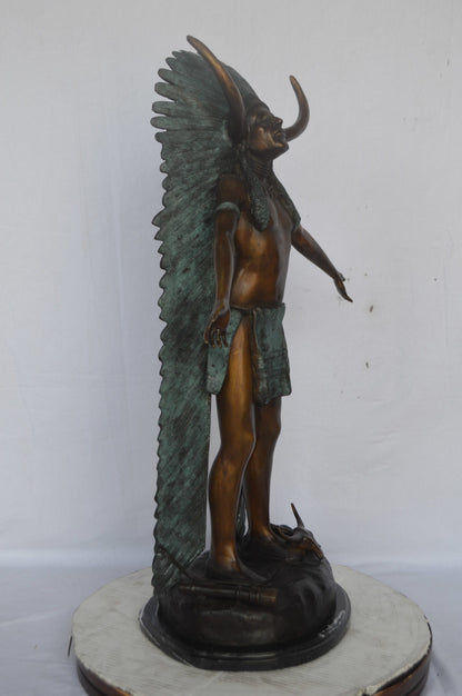 Indian with Plume bronze statue - Size: 22"L x 14"W x 38"H.