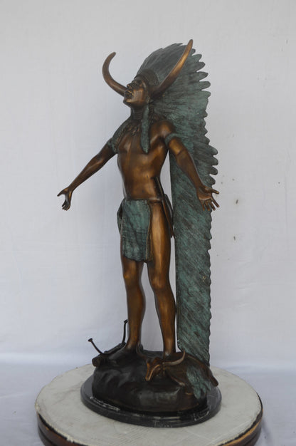 Indian with Plume bronze statue - Size: 22"L x 14"W x 38"H.