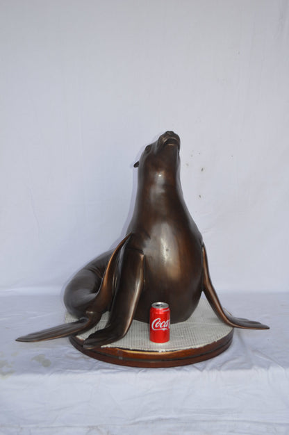 Seal Fountain made of bronze statue - Size: 35"L x 24"W x 27"H.
