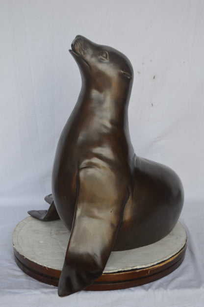 Seal Fountain made of bronze statue - Size: 35"L x 24"W x 27"H.