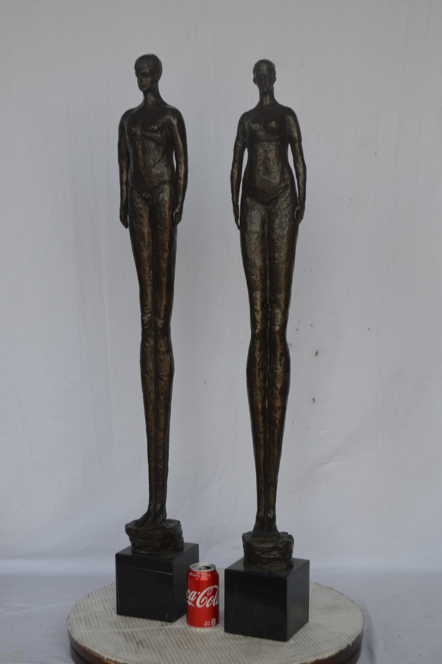 Modern art Pair, tall couple standing bronze statue - Size: 5"L x 5"W x 45"H.