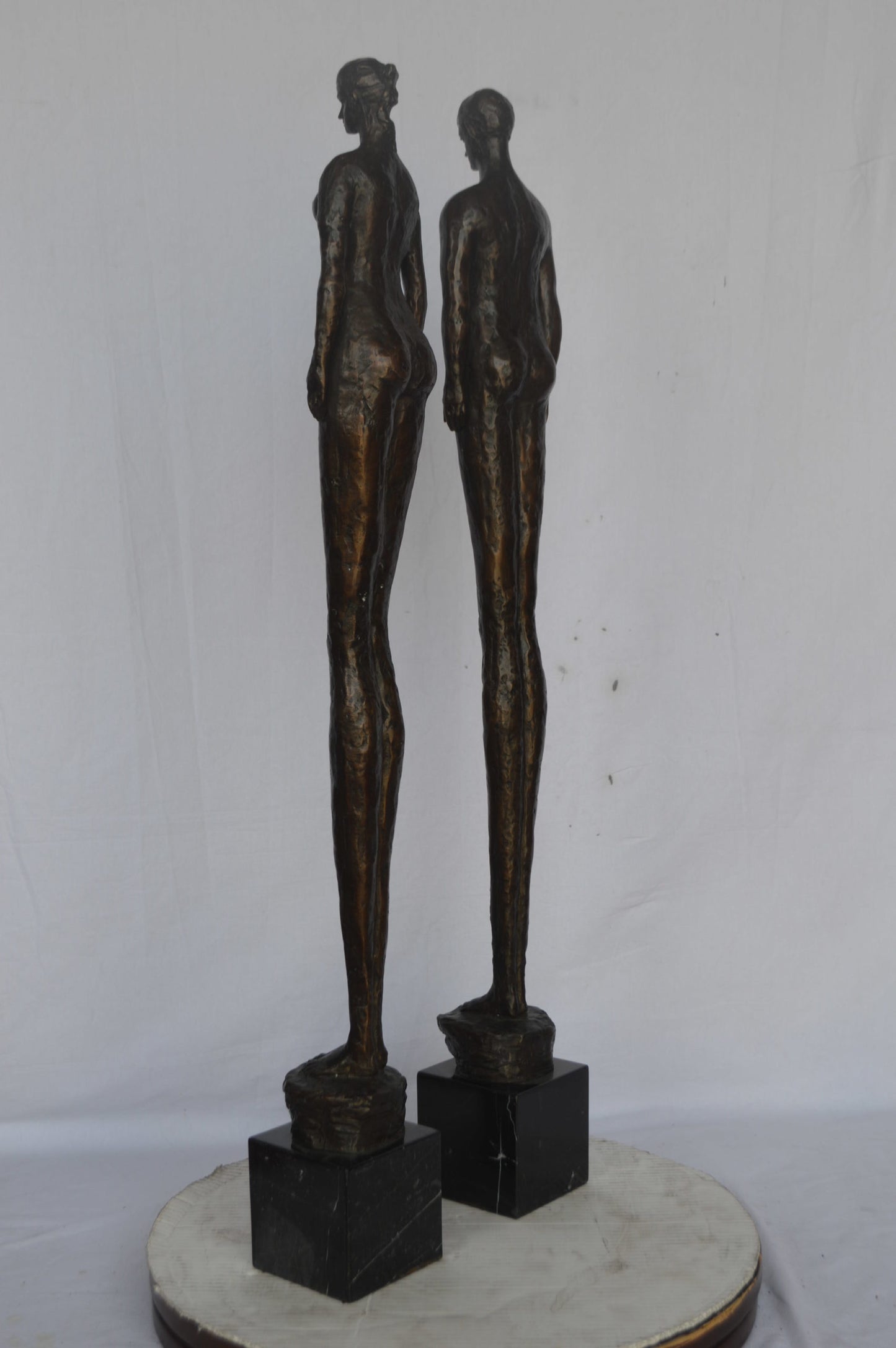 Modern art Pair, tall couple standing bronze statue - Size: 5"L x 5"W x 45"H.