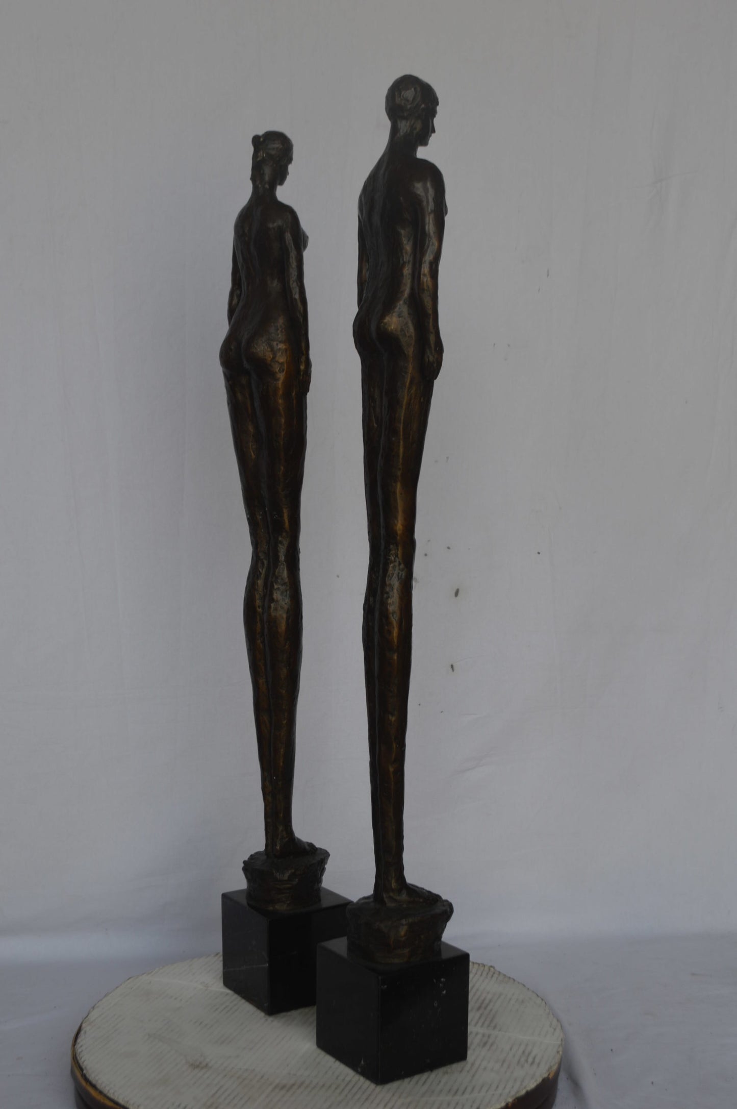 Modern art Pair, tall couple standing bronze statue - Size: 5"L x 5"W x 45"H.
