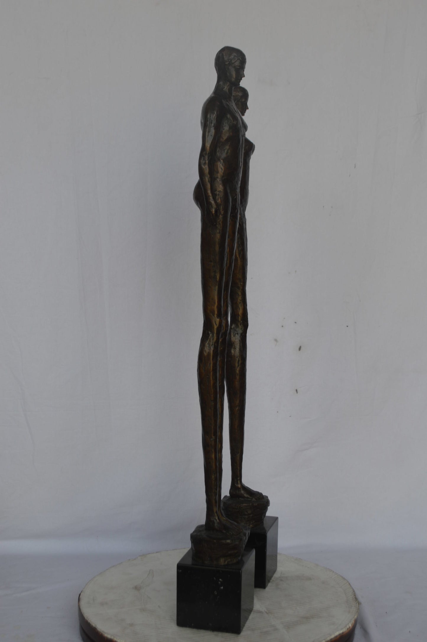 Modern art Pair, tall couple standing bronze statue - Size: 5"L x 5"W x 45"H.