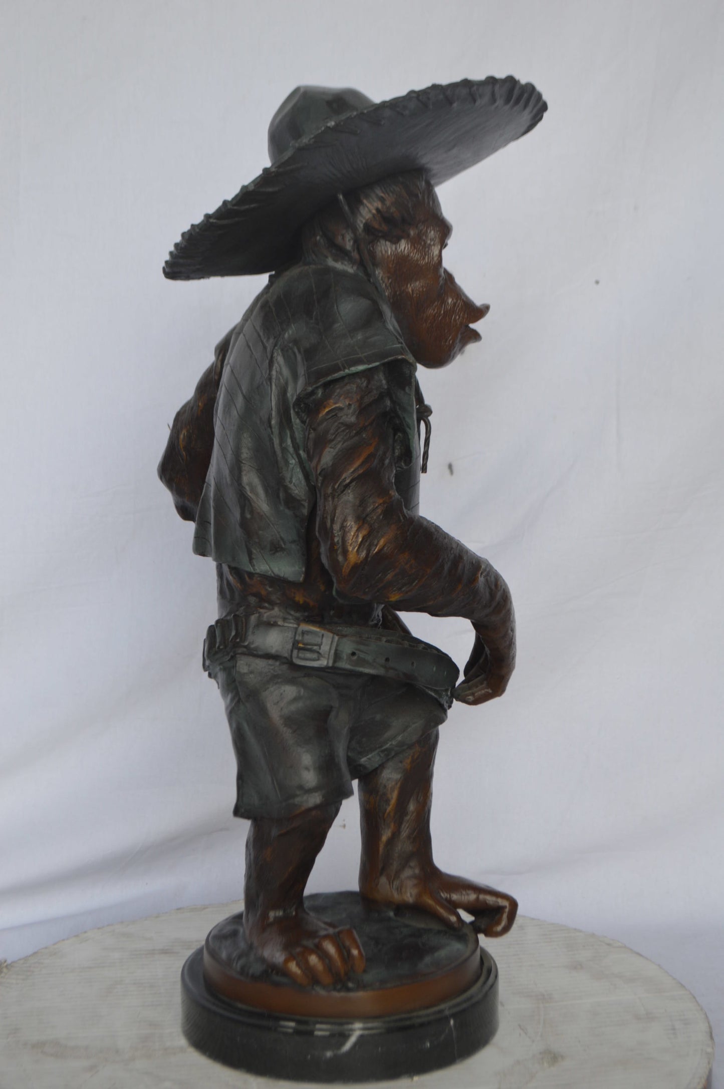 Monkey Cowboy bronze statue - Size: 14"L x 12"W x 29"H.