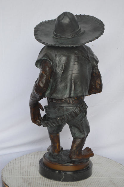 Monkey Cowboy bronze statue - Size: 14"L x 12"W x 29"H.