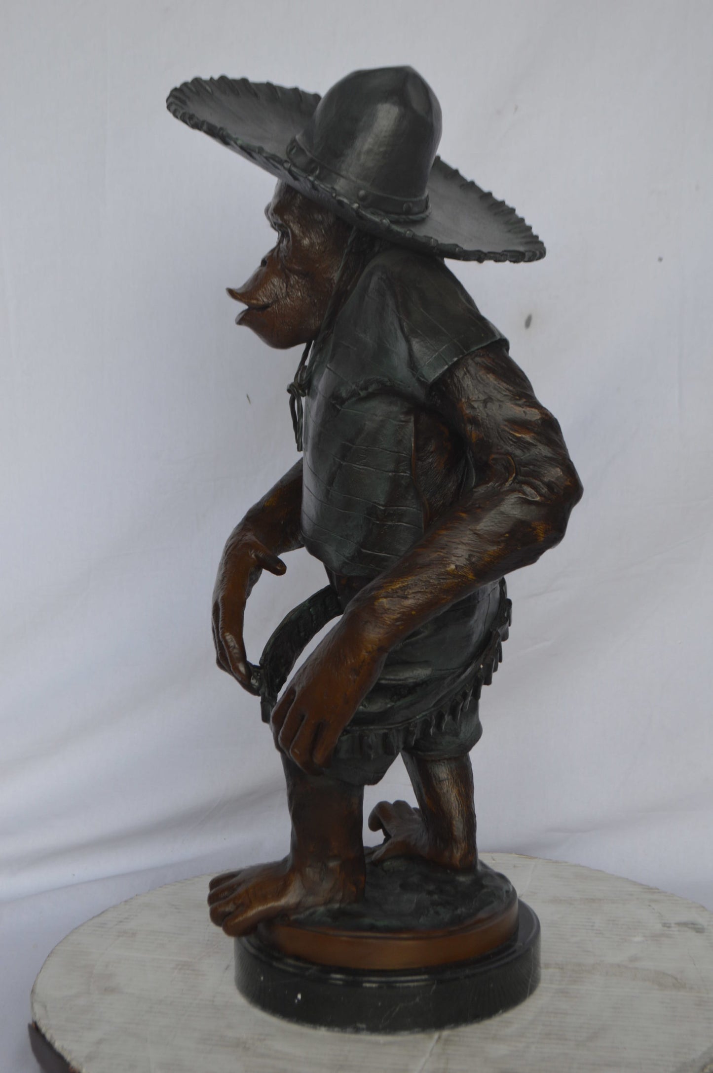 Monkey Cowboy bronze statue - Size: 14"L x 12"W x 29"H.