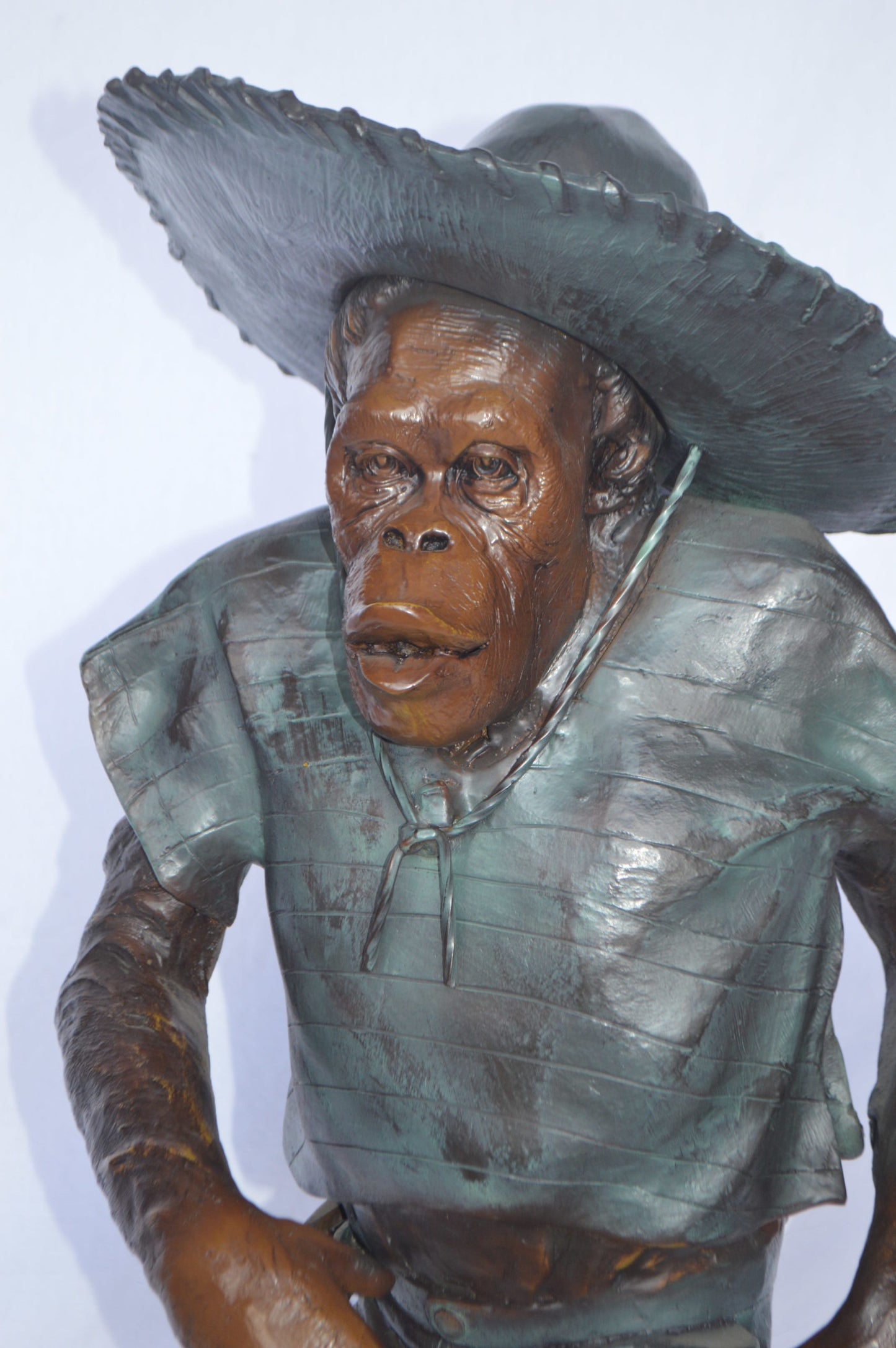 Monkey Cowboy bronze statue - Size: 14"L x 12"W x 29"H.