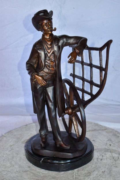 Cowboy Standing by His Carriage Bronze Statue Size: 12" x 8" x 23"H