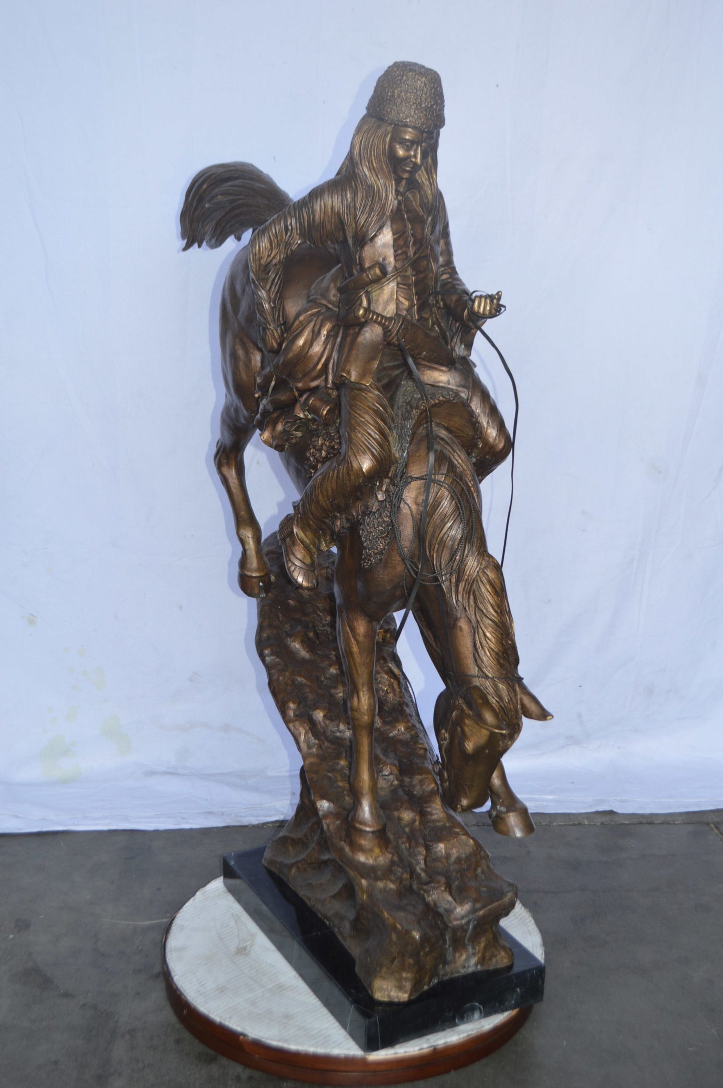 Giant mountain man Remington Replica bronze statue - Size: 37"L x 13"W x 54"H.