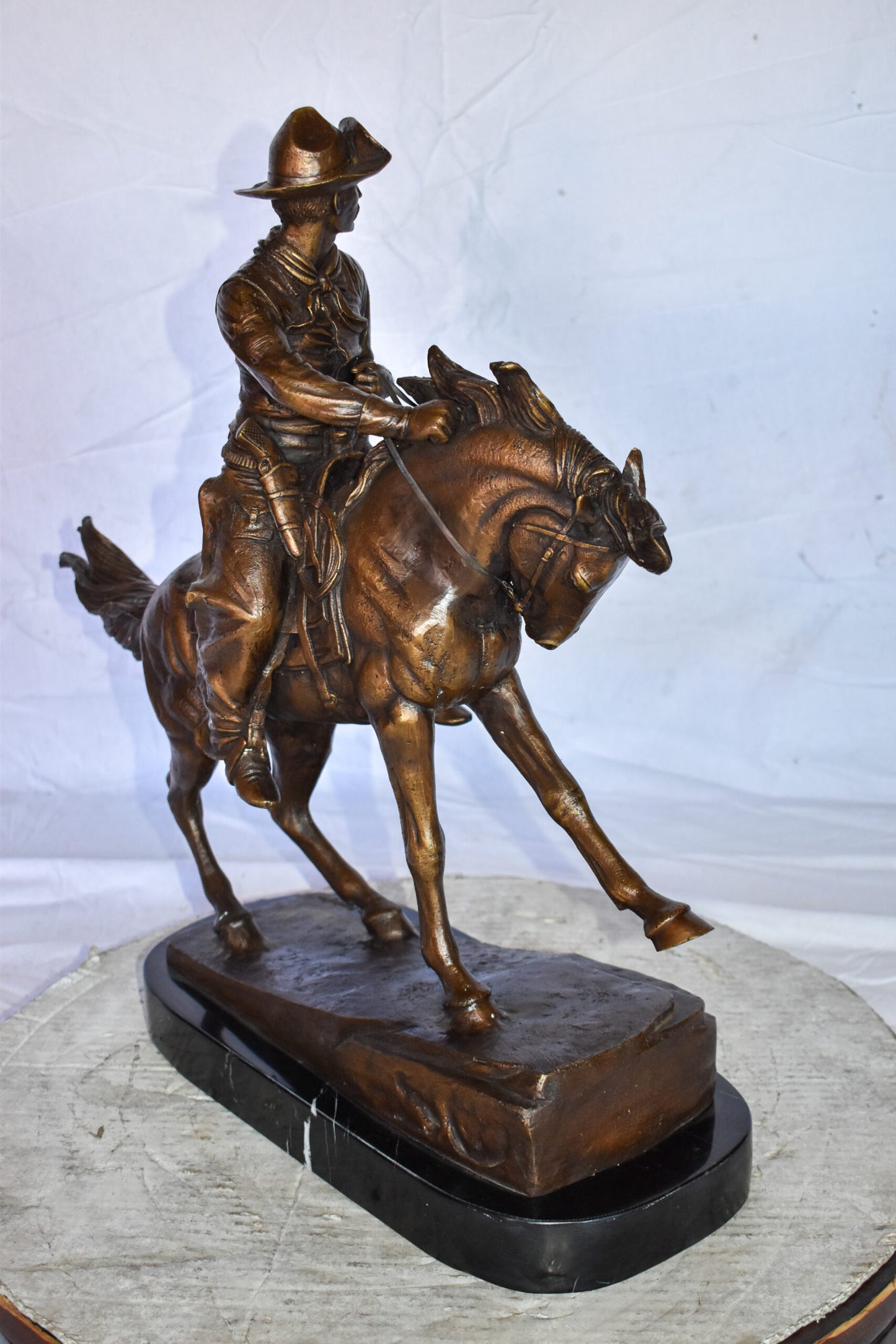 Cowboy Remington Replica Bronze Statue on Triple Marble Size: 25" x 8" x 24"H