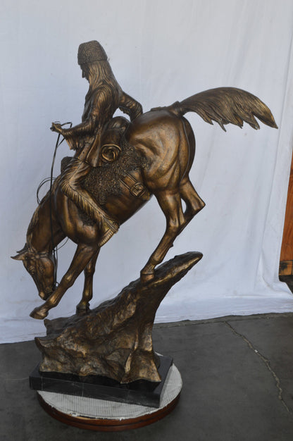 Giant mountain man Remington Replica bronze statue - Size: 37"L x 13"W x 54"H.