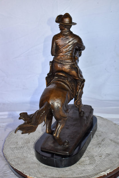 Cowboy Remington Replica Bronze Statue on Triple Marble Size: 25" x 8" x 24"H