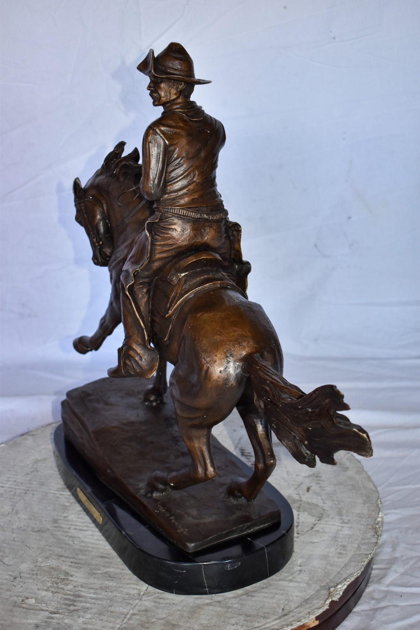 Cowboy Remington Replica Bronze Statue on Triple Marble Size: 25" x 8" x 24"H