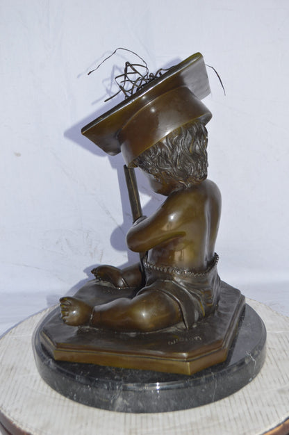 Graduating baby bronze statue -  Size: 16"L x 16"W x 21"H.