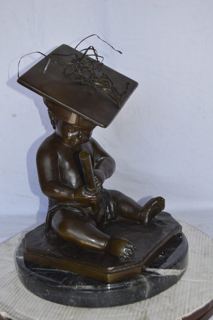 Graduating baby bronze statue -  Size: 16"L x 16"W x 21"H.