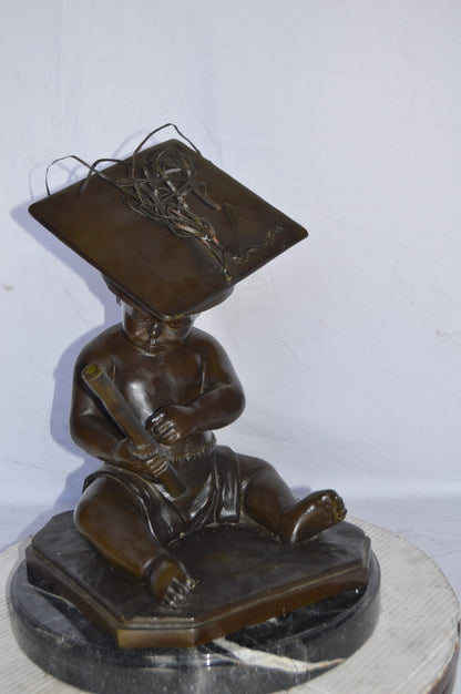 Graduating baby bronze statue -  Size: 16"L x 16"W x 21"H.