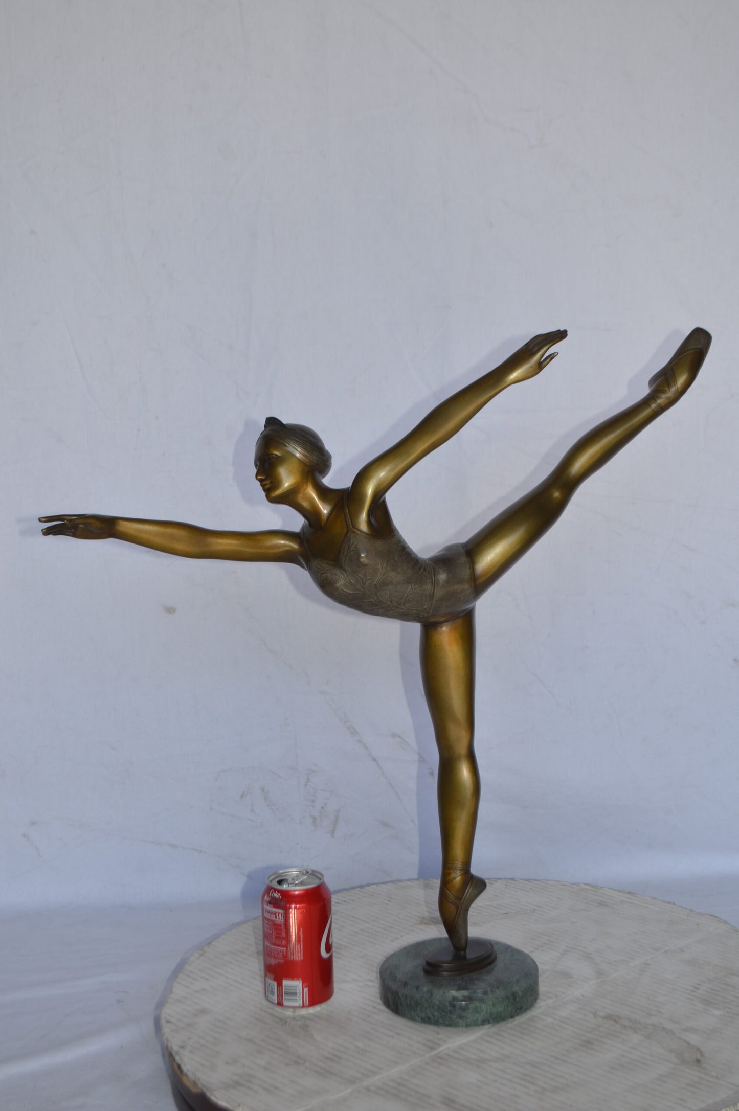Ballerina Dancing in Action Bronze Statue - Size: 25"L x 8"W x 29"H.