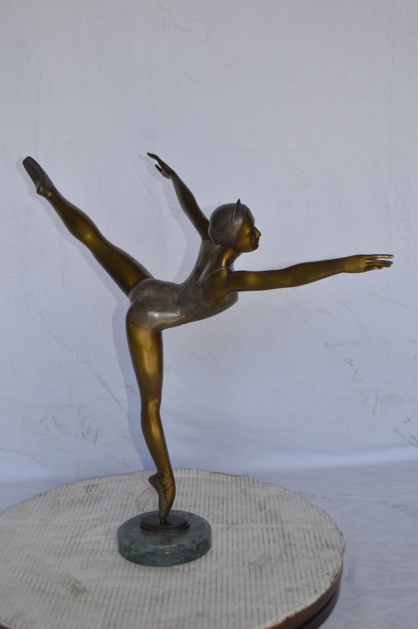Ballerina Dancing in Action Bronze Statue - Size: 25"L x 8"W x 29"H.