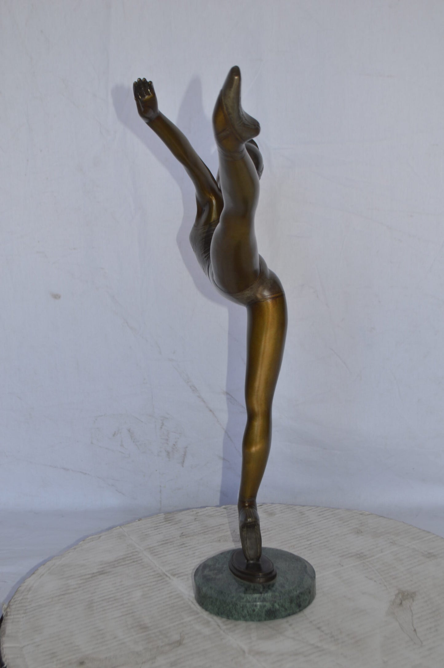 Ballerina Dancing in Action Bronze Statue - Size: 25"L x 8"W x 29"H.