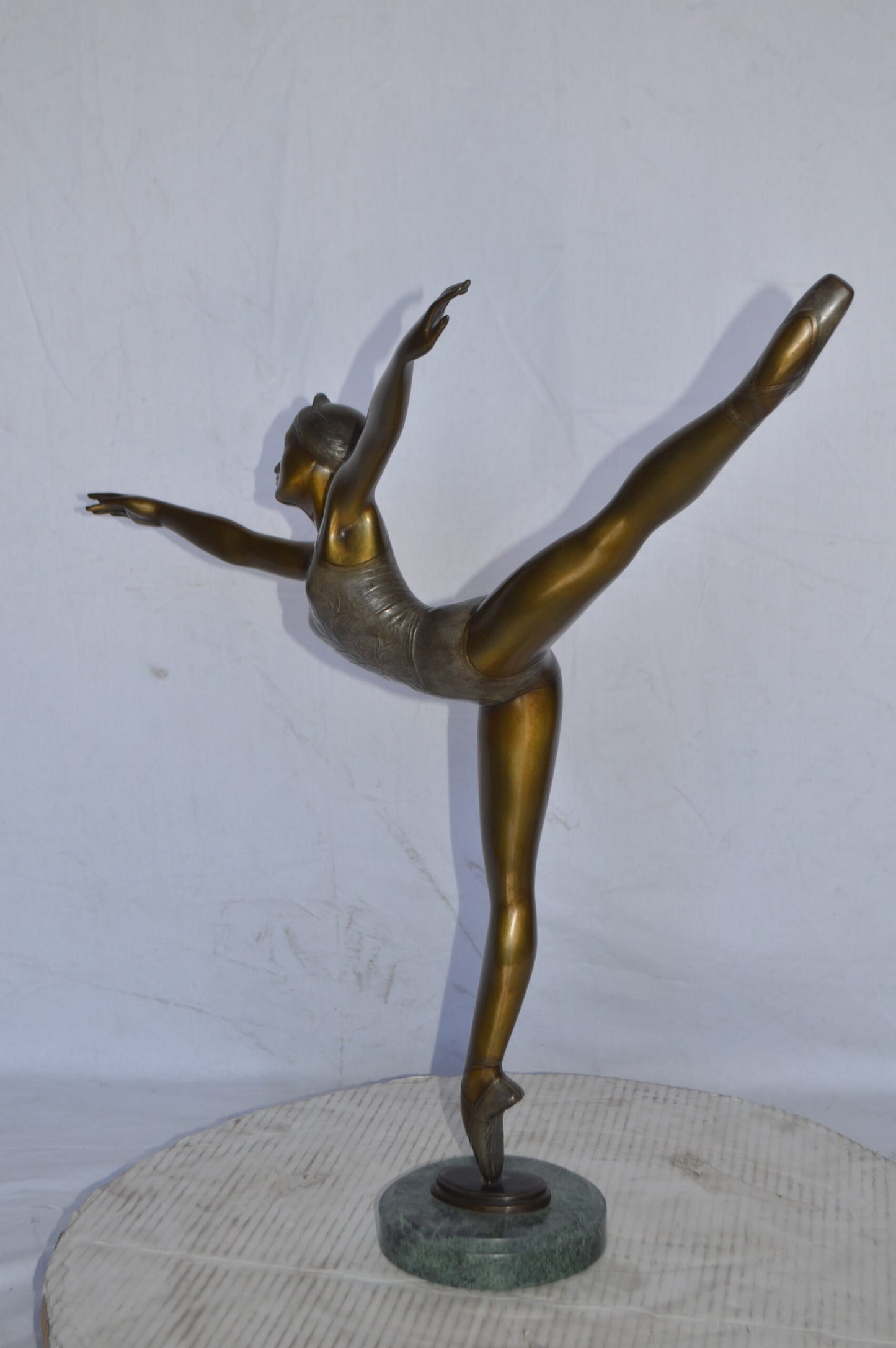 Ballerina Dancing in Action Bronze Statue - Size: 25"L x 8"W x 29"H.