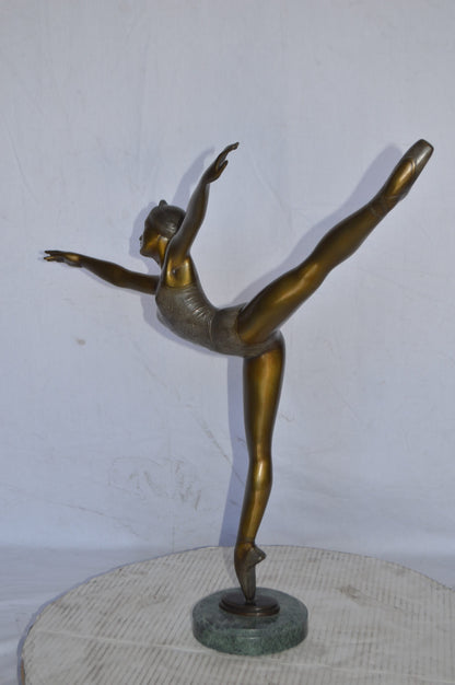 Ballerina Dancing in Action Bronze Statue - Size: 25"L x 8"W x 29"H.