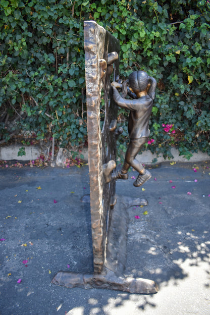 Young Girl Playing on A Climbing Wall Bronze Statue Life Size 44" x 26" x 57"H