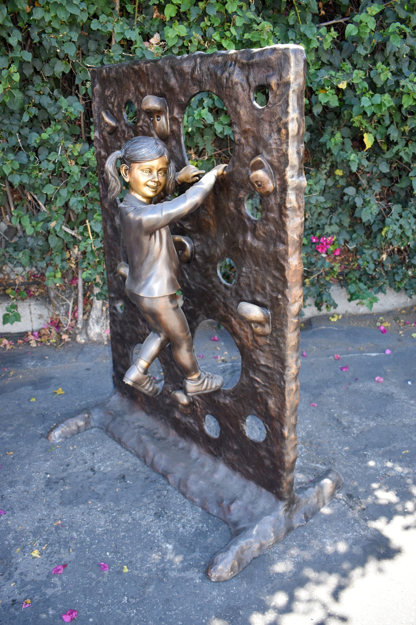 Young Girl Playing on A Climbing Wall Bronze Statue Life Size 44" x 26" x 57"H