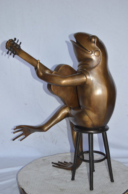 Frog Playing on a guitar Bronze Statue  - Size: 23"L x 21"W x 29"H.