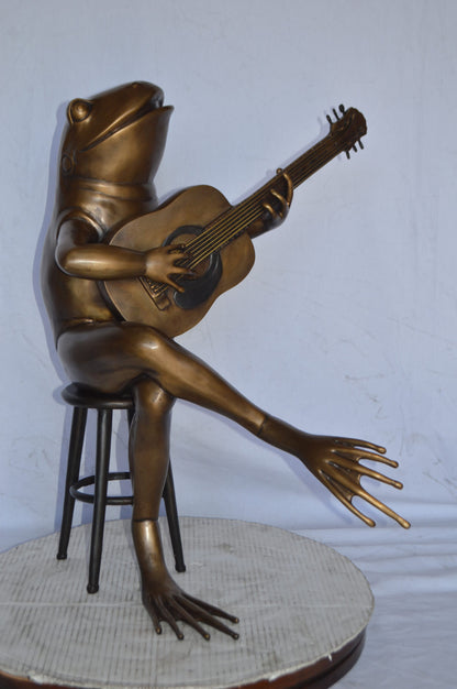 Frog Playing on a guitar Bronze Statue  - Size: 23"L x 21"W x 29"H.