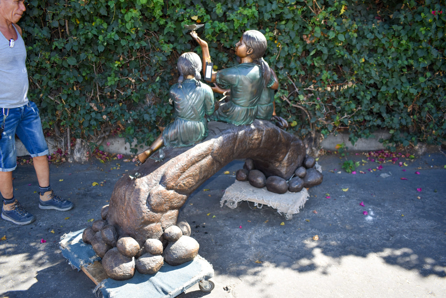 Three Kids Playing With Butterflies Bronze Statue -  Size: 70"L x 25"W x 45"H.