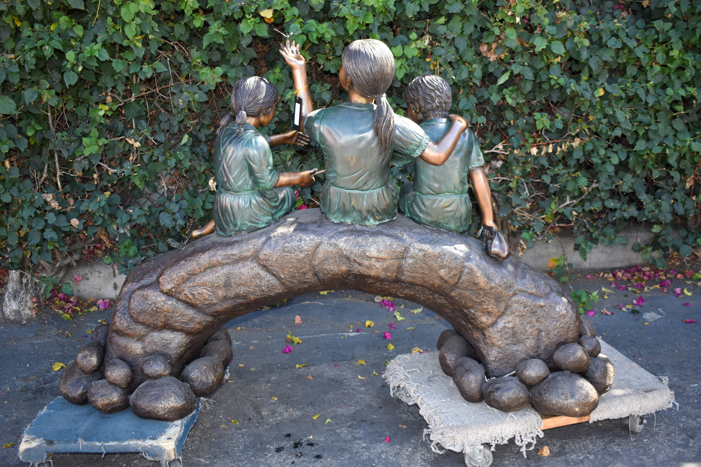 Three Kids Playing With Butterflies Bronze Statue -  Size: 70"L x 25"W x 45"H.
