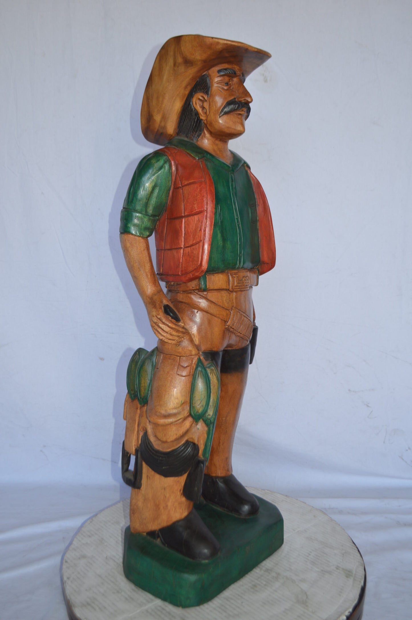 Cowboy Made of Wood Statue - Large - Size: 6"L x 10"W x 31"H.